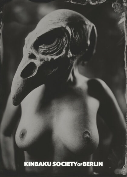 Mysterious woman with bird skull mask